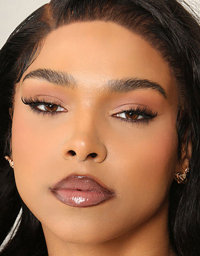 model with brown lipliner and smokey brown gloss